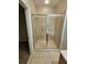 Bathroom with tiled shower and glass enclosure at 3341 Whitestone Cir # 205, Kissimmee, FL 34741