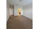 Main bedroom with en-suite bathroom access at 3341 Whitestone Cir # 205, Kissimmee, FL 34741