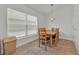Cozy breakfast nook with natural light and views of the backyard at 434 Panaro Ln, Haines City, FL 33844