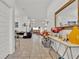 Open foyer leading to living areas with tile flooring and neutral paint at 434 Panaro Ln, Haines City, FL 33844