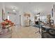 Open foyer leading to dining area with tile flooring and neutral paint at 434 Panaro Ln, Haines City, FL 33844