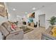 Spacious living room featuring tile flooring, neutral walls, and comfortable seating at 434 Panaro Ln, Haines City, FL 33844