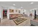 Open living room with tile floors and neutral walls, offering a spacious feel at 434 Panaro Ln, Haines City, FL 33844