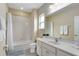 Well-appointed bathroom with a shower/tub combo and a vanity at 4439 Shiva Loop, Kissimmee, FL 34746