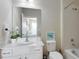 Clean bathroom with a vanity, toilet, and bathtub at 4439 Shiva Loop, Kissimmee, FL 34746