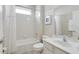 Clean bathroom with a bathtub, shower, and vanity at 4439 Shiva Loop, Kissimmee, FL 34746