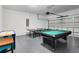 Fun game room featuring a pool table, ping pong, and air hockey at 4439 Shiva Loop, Kissimmee, FL 34746