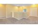 Upstairs hallway with carpeted flooring and access to bedrooms at 4439 Shiva Loop, Kissimmee, FL 34746