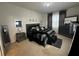 Well-appointed bedroom with a modern bed, mirrored accents, and neutral color scheme at 446 Citrus Isle Loop, Davenport, FL 33837