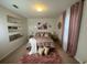 Serene bedroom with a cozy bed and neutral color scheme at 446 Citrus Isle Loop, Davenport, FL 33837