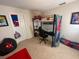 bedroom with a lofted bed, desk, and Spider-Personal theme at 446 Citrus Isle Loop, Davenport, FL 33837