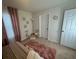 Bright bedroom with a comfy bed and stylish decor at 446 Citrus Isle Loop, Davenport, FL 33837