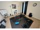 Home gym space with various fitness equipment including weight bench, free weights, and workout mat at 446 Citrus Isle Loop, Davenport, FL 33837