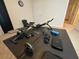 Home gym with weights, bench, and mat at 446 Citrus Isle Loop, Davenport, FL 33837