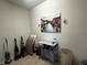 Laundry room with ironing board and storage at 446 Citrus Isle Loop, Davenport, FL 33837