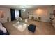 Spacious living room with plush seating and a stylish coffee table at 446 Citrus Isle Loop, Davenport, FL 33837