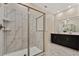 Bathroom with double vanity and a large walk-in shower at 4575 Narrative Ln, Kissimmee, FL 34746