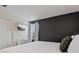 Main bedroom with a large bed and TV at 4575 Narrative Ln, Kissimmee, FL 34746