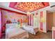 Themed bedroom with two twin beds and a mural at 4575 Narrative Ln, Kissimmee, FL 34746