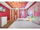 Charming bedroom with princess theme, two beds, and floral ceiling at 4575 Narrative Ln, Kissimmee, FL 34746
