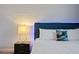 Main bedroom with a large bed and wave wall at 4575 Narrative Ln, Kissimmee, FL 34746