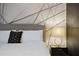 Main bedroom with large bed and geometric accent wall at 4575 Narrative Ln, Kissimmee, FL 34746