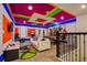 Game room with Marvel theme, video games, and seating area at 4575 Narrative Ln, Kissimmee, FL 34746