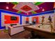 Game room with air hockey, arcade games, and Marvel theme at 4575 Narrative Ln, Kissimmee, FL 34746