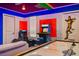 Game room featuring Simpsons and Marvel themed decor at 4575 Narrative Ln, Kissimmee, FL 34746