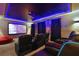 Home theater with Star Wars theme, comfy seating, and projector at 4575 Narrative Ln, Kissimmee, FL 34746