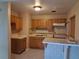 Traditional kitchen features classic wood cabinets and tiled countertops at 4824 Shoshone St, Orlando, FL 32819