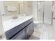 Clean bathroom with a walk-in shower and vanity at 4902 Windermere Ave, Kissimmee, FL 34746