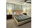 Spacious bedroom with a king-size bed and ample natural light at 4902 Windermere Ave, Kissimmee, FL 34746