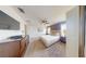 Spacious main bedroom with large bed and TV at 4902 Windermere Ave, Kissimmee, FL 34746