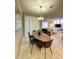 Elegant dining room with modern table and chandelier at 4902 Windermere Ave, Kissimmee, FL 34746