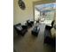 Relaxing patio with outdoor seating and view of the pool at 4902 Windermere Ave, Kissimmee, FL 34746