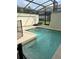 Inviting screened-in pool with lounge chairs at 4902 Windermere Ave, Kissimmee, FL 34746