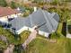 Aerial view showcasing home and landscape at 5666 Merlin Way, St Cloud, FL 34772