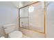 Clean bathroom with a shower/tub combo and window at 5666 Merlin Way, St Cloud, FL 34772