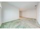 Spacious bedroom with ceiling fan and carpet at 5666 Merlin Way, St Cloud, FL 34772