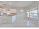 Bright breakfast nook with bay window and chandelier at 5666 Merlin Way, St Cloud, FL 34772