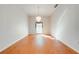 Formal dining room with hardwood floors and chandelier at 5666 Merlin Way, St Cloud, FL 34772