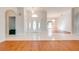 Bright and airy foyer with tile floors and double doors at 5666 Merlin Way, St Cloud, FL 34772