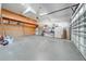 Garage with overhead storage and workbench at 5666 Merlin Way, St Cloud, FL 34772