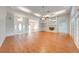 Living room features hardwood floors and a fireplace at 5666 Merlin Way, St Cloud, FL 34772