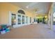 Large covered patio with access to the pool at 5666 Merlin Way, St Cloud, FL 34772