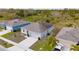 Aerial view of a house and surrounding neighborhood at 1067 Haines Dr, Winter Haven, FL 33881