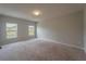 Spacious bedroom with neutral walls and carpet flooring at 1067 Haines Dr, Winter Haven, FL 33881