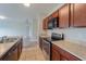Modern kitchen featuring stainless steel appliances and ample cabinetry at 1067 Haines Dr, Winter Haven, FL 33881