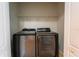 Laundry room with shelving and a washer and dryer at 1067 Haines Dr, Winter Haven, FL 33881